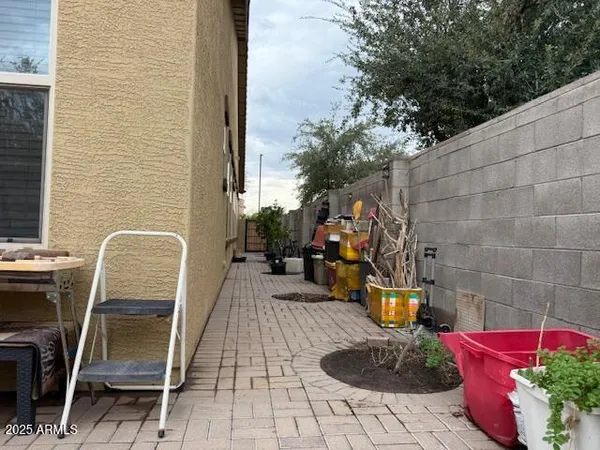 a view of swimming pool with chairs
