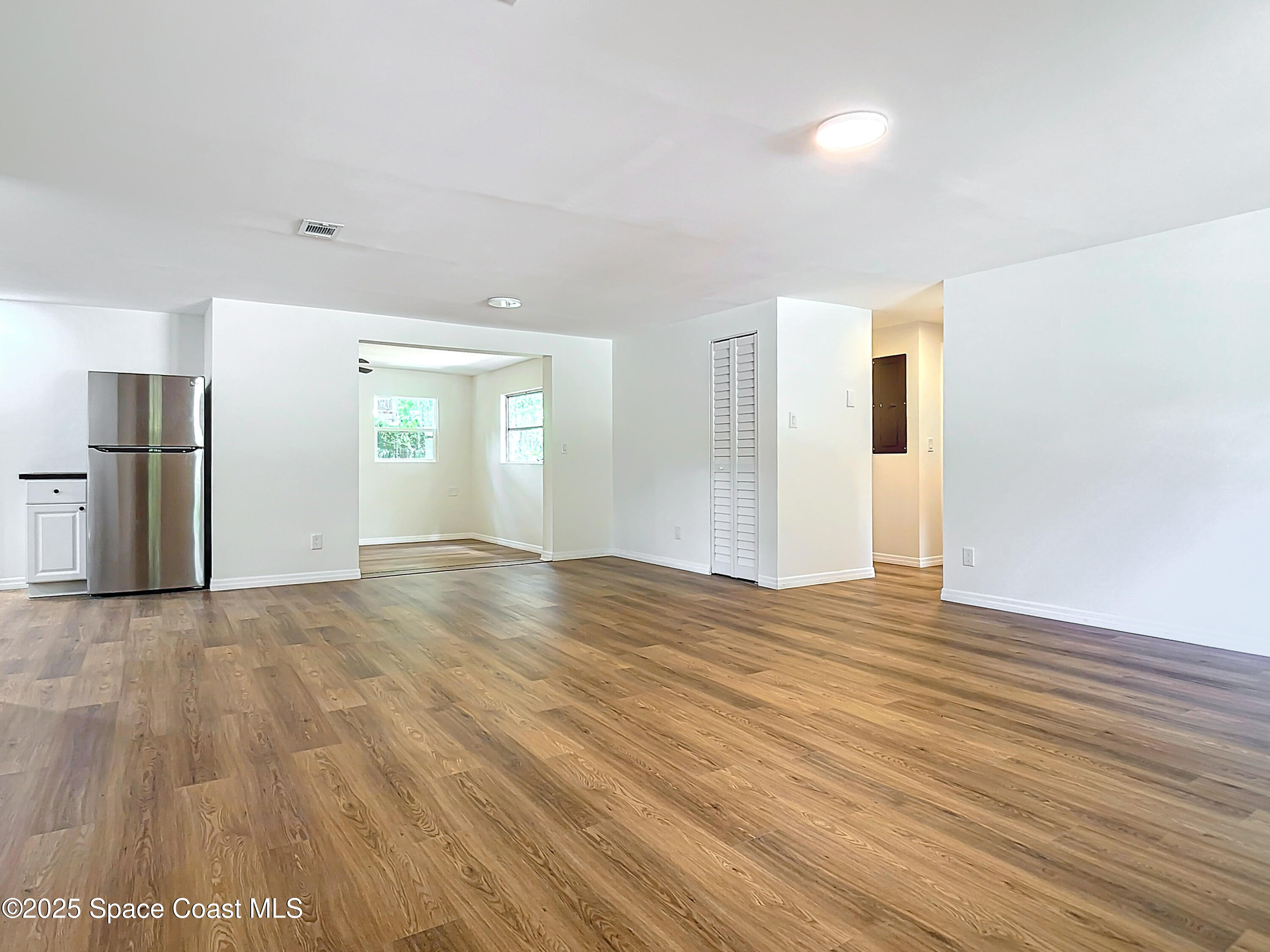 392 Arora Boulevard Orange Park, FL 32073 - Photo 13 of 45 a view of empty room with wooden floor