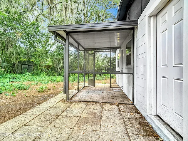 a view of backyard with green space