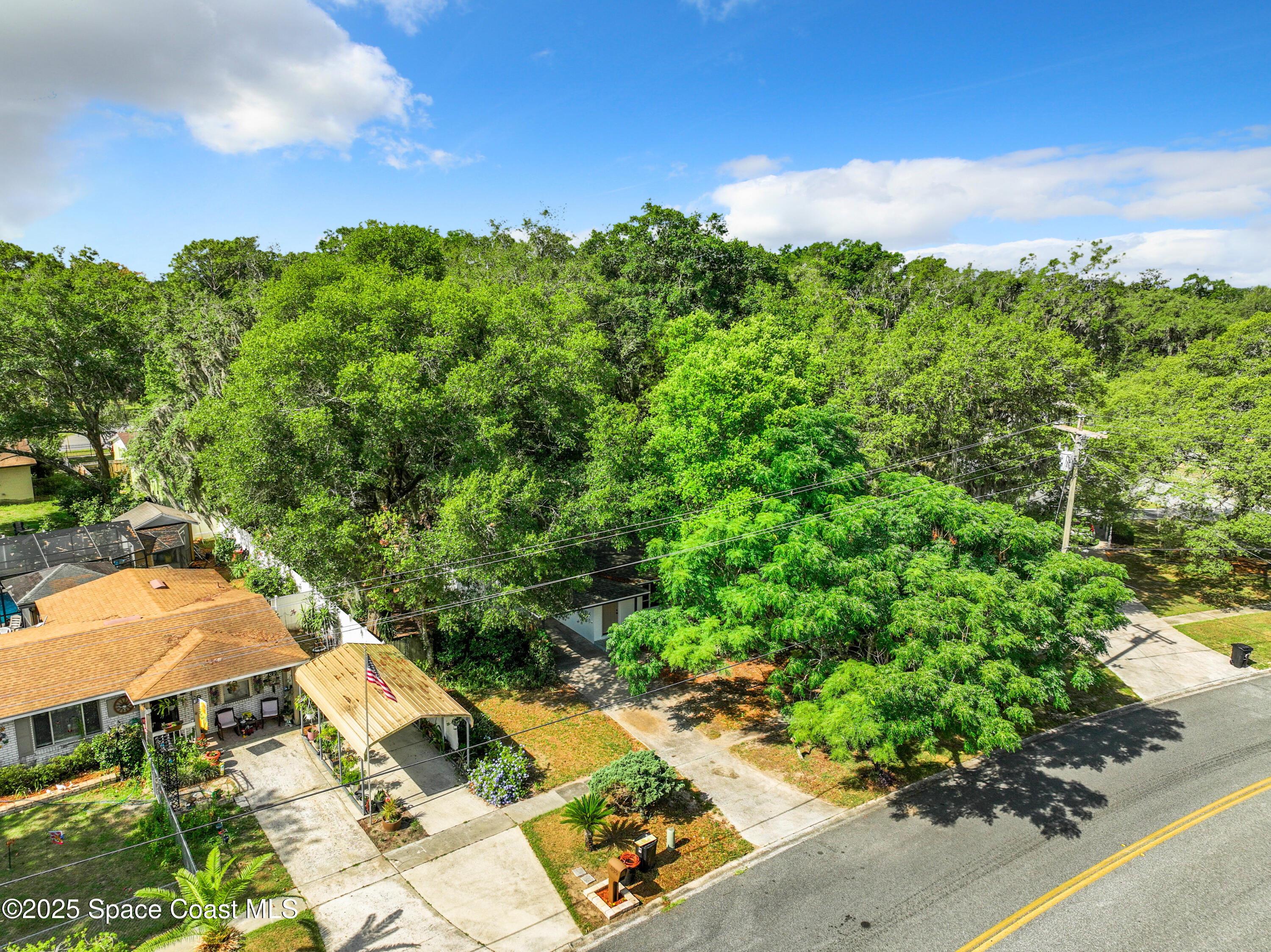 392 Arora Boulevard Orange Park, FL 32073 - Photo 41 of 45 an aerial view of a residential houses with yard and outdoor seating