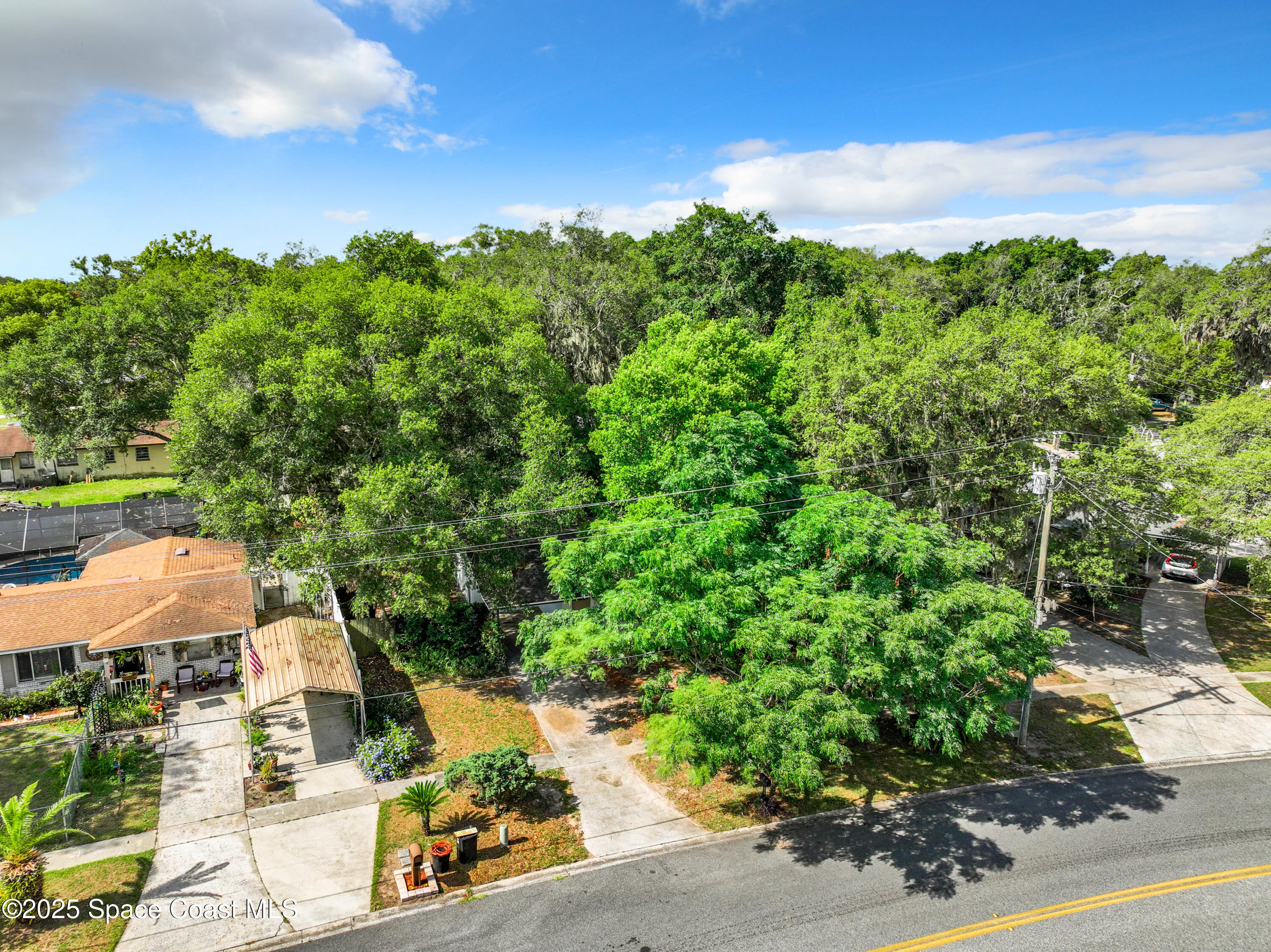392 Arora Boulevard Orange Park, FL 32073 - Photo 43 of 45 an aerial view of a house with yard