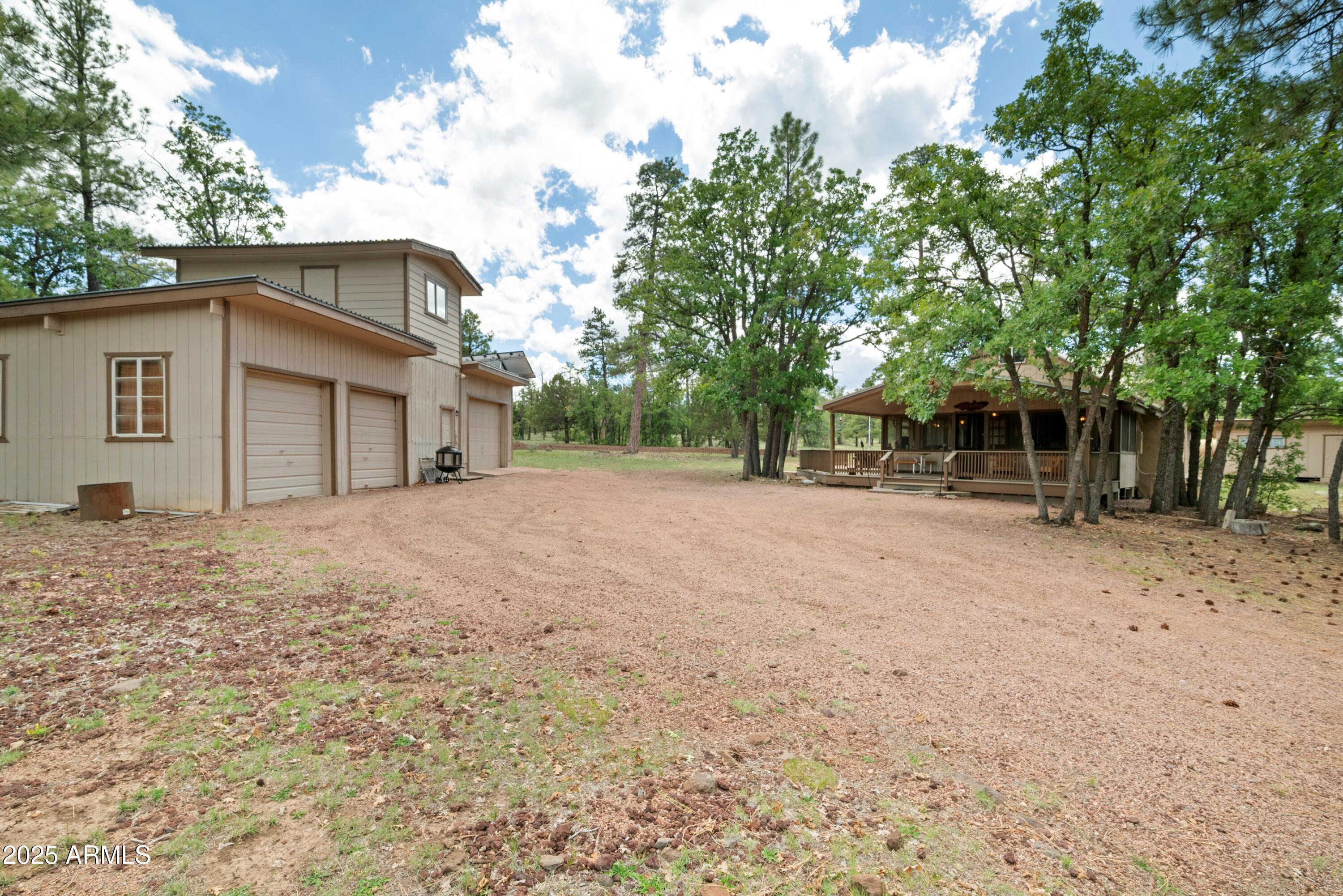 a house with trees in the background