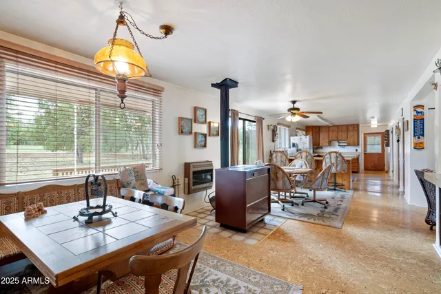 a house that has a tree in front of the house