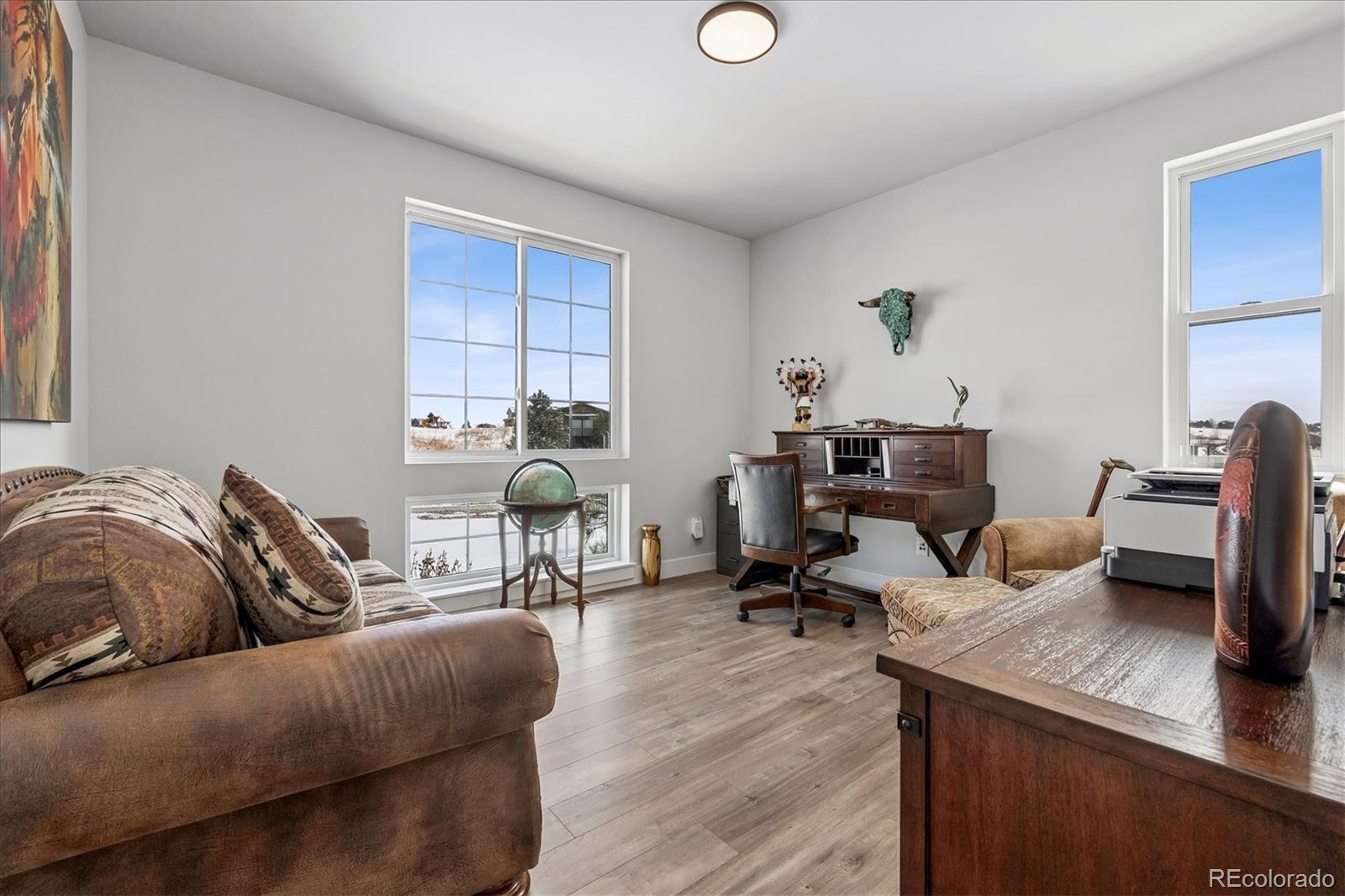 5601 Raintree Drive Parker, CO 80134 - Photo 19 of 50 a living room with furniture and a couch