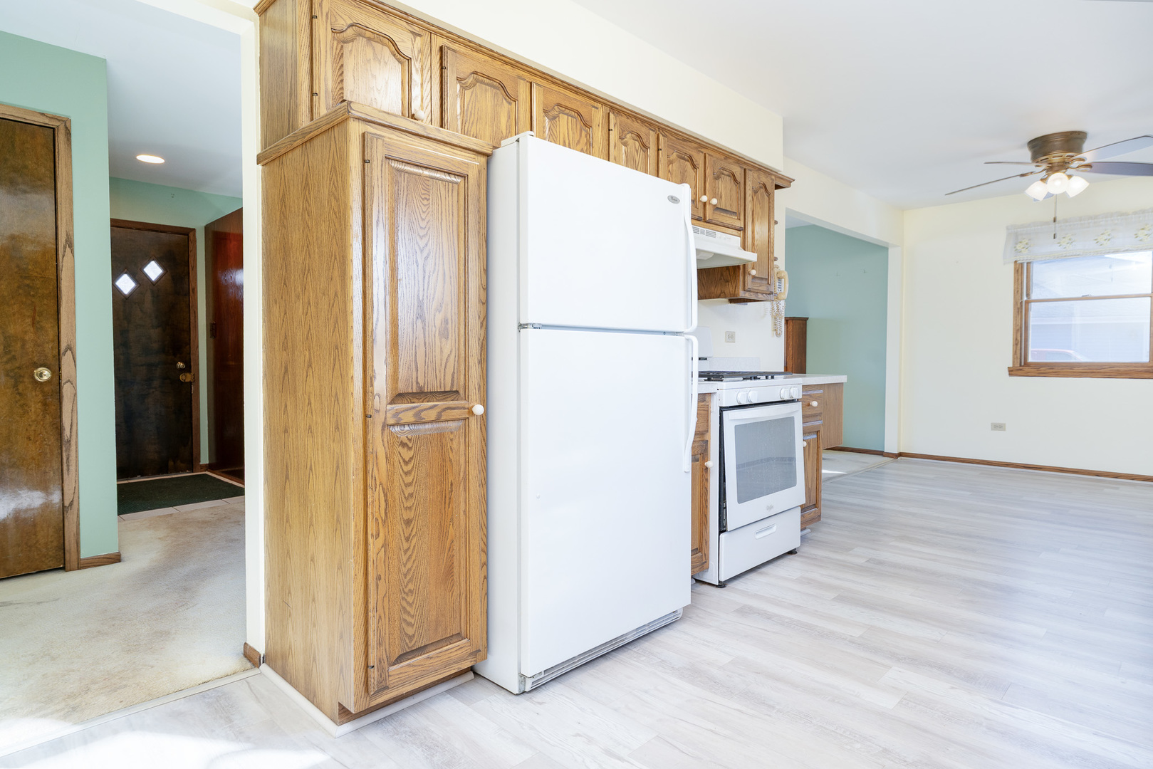 1327 Timberline Drive Joliet, IL 60431 - Photo 11 of 35 a kitchen with stainless steel appliances granite countertop a refrigerator and a stove