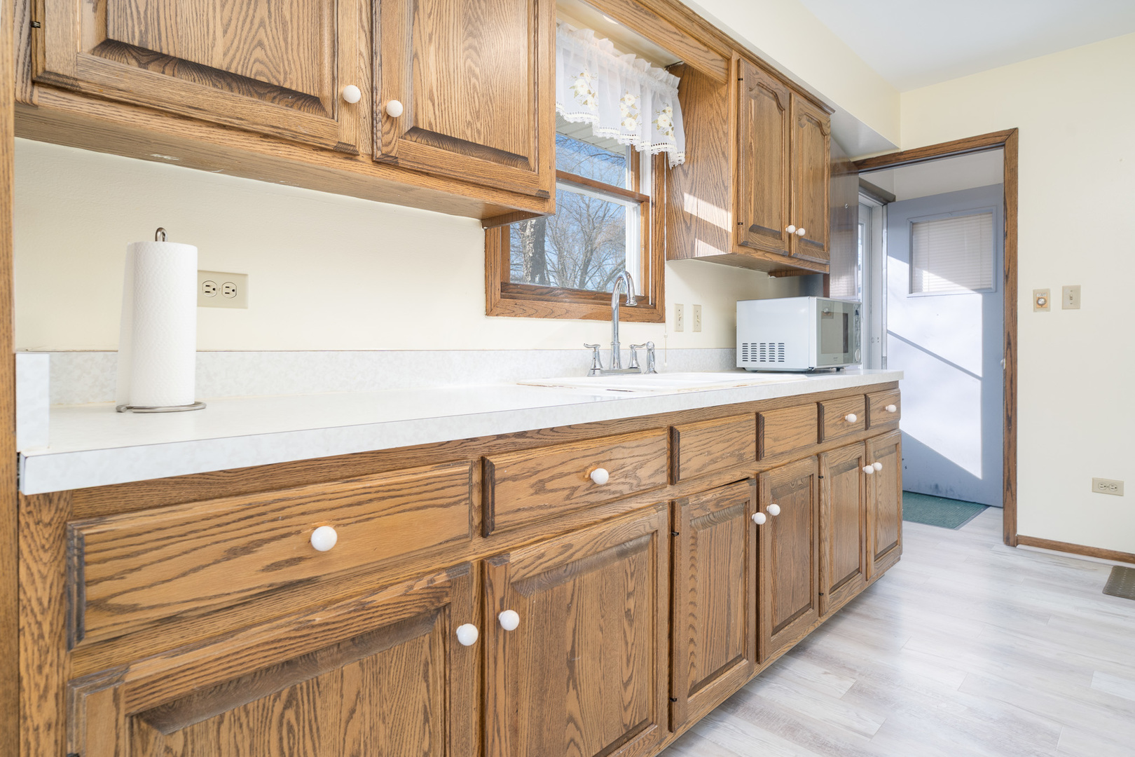 1327 Timberline Drive Joliet, IL 60431 - Photo 12 of 35 a bathroom with a sink a mirror and a shower