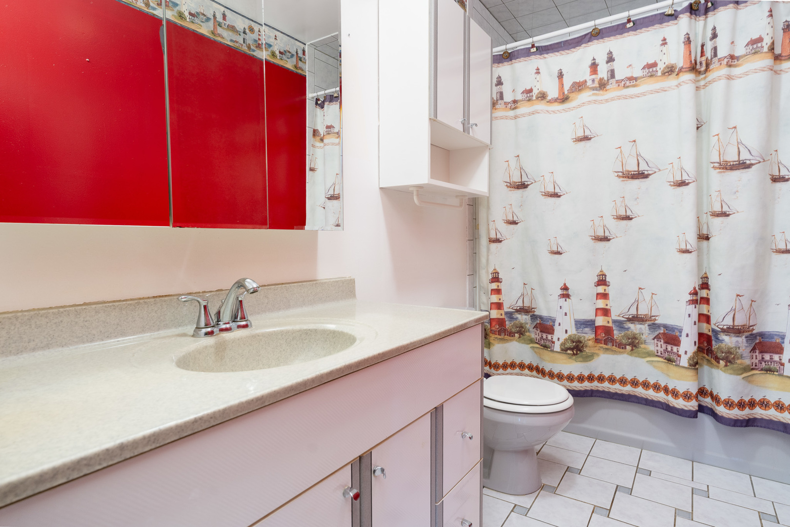 1327 Timberline Drive Joliet, IL 60431 - Photo 18 of 35 a bathroom with a sink a toilet and shower curtain