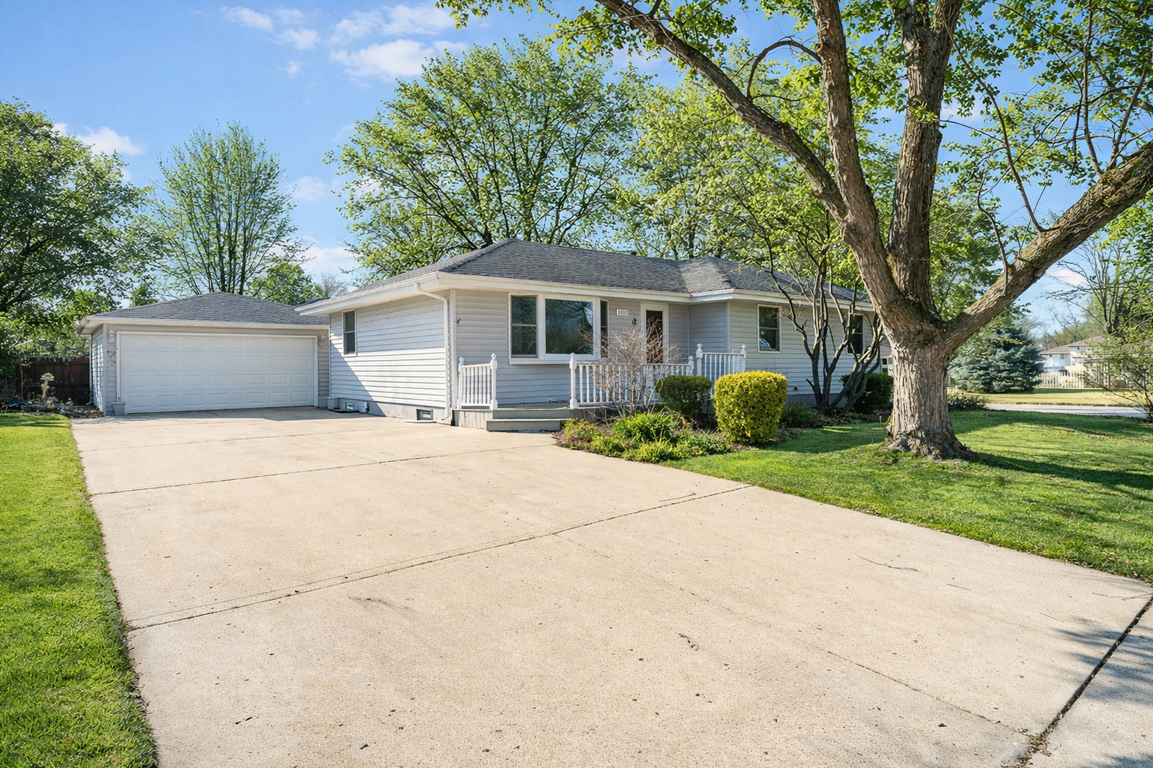 1327 Timberline Drive Joliet, IL 60431 - Photo 2 of 35 a front view of house with yard and green space