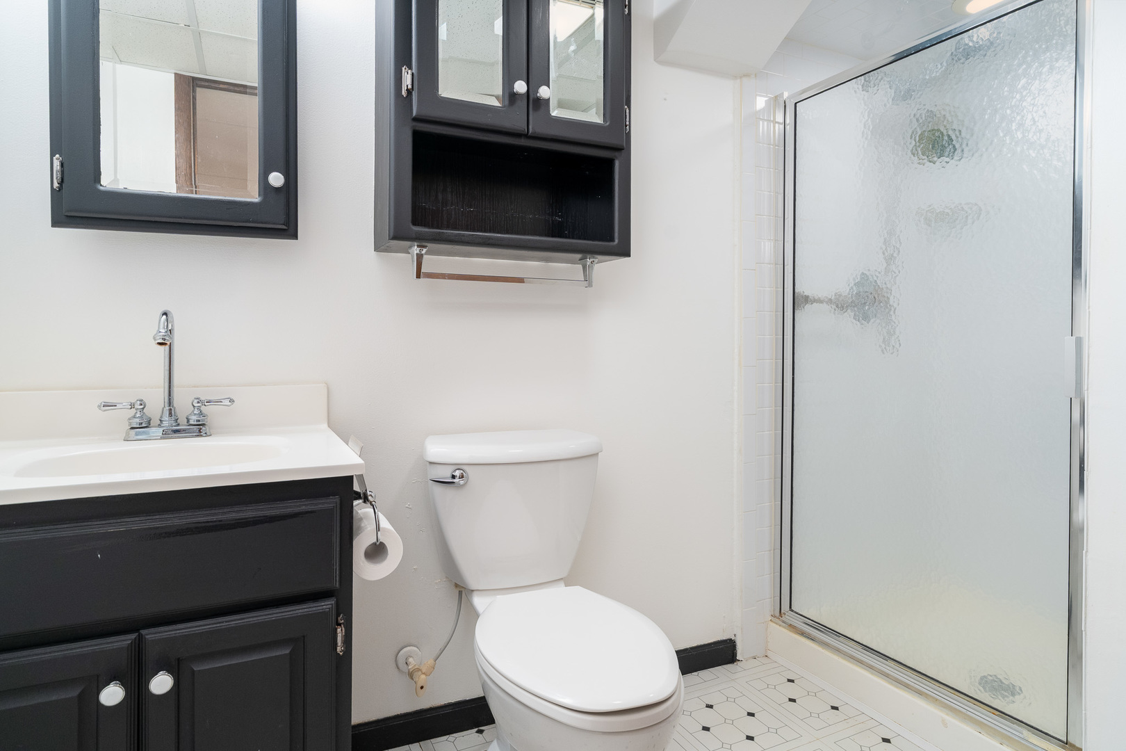 1327 Timberline Drive Joliet, IL 60431 - Photo 24 of 35 a bathroom with a toilet a sink and mirror