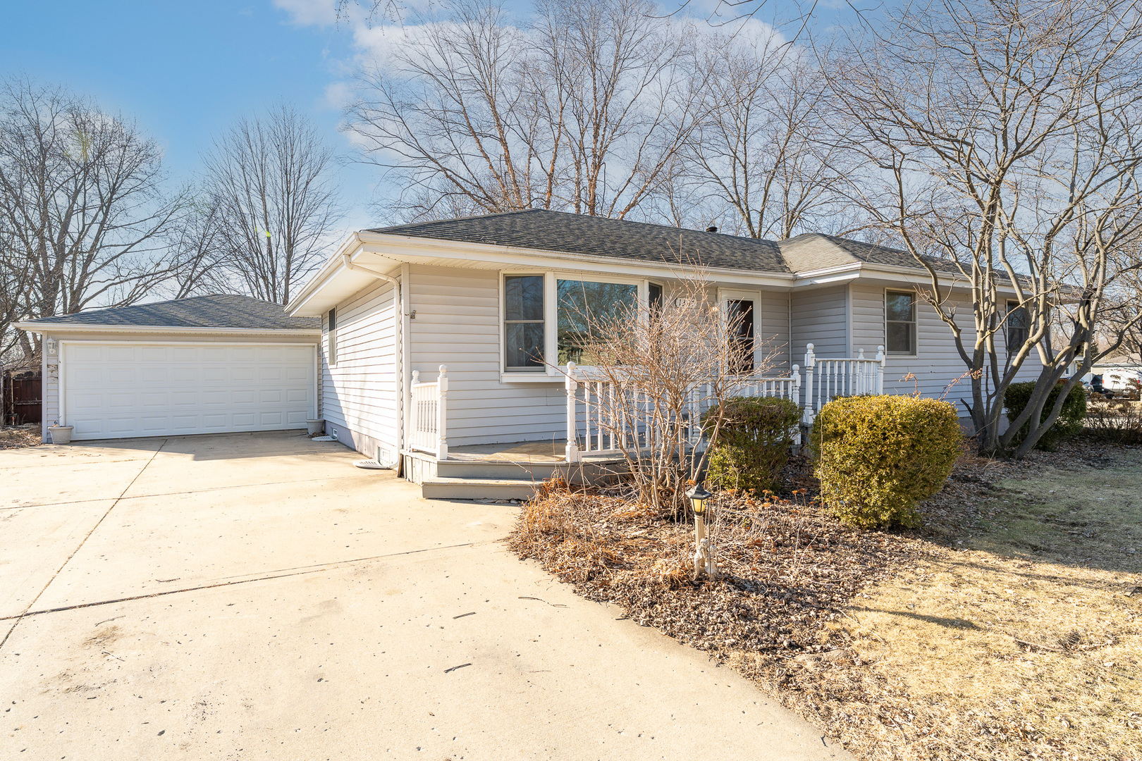 1327 Timberline Drive Joliet, IL 60431 - Photo 3 of 35 a front view of a house with garden