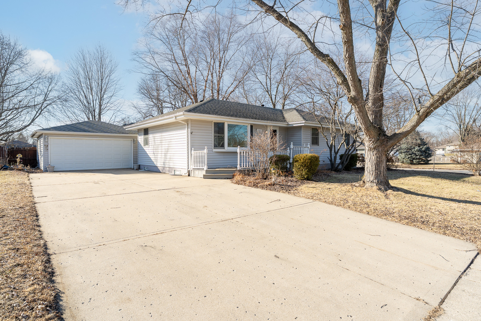 1327 Timberline Drive Joliet, IL 60431 - Photo 4 of 35 a view of a house with snow on the road