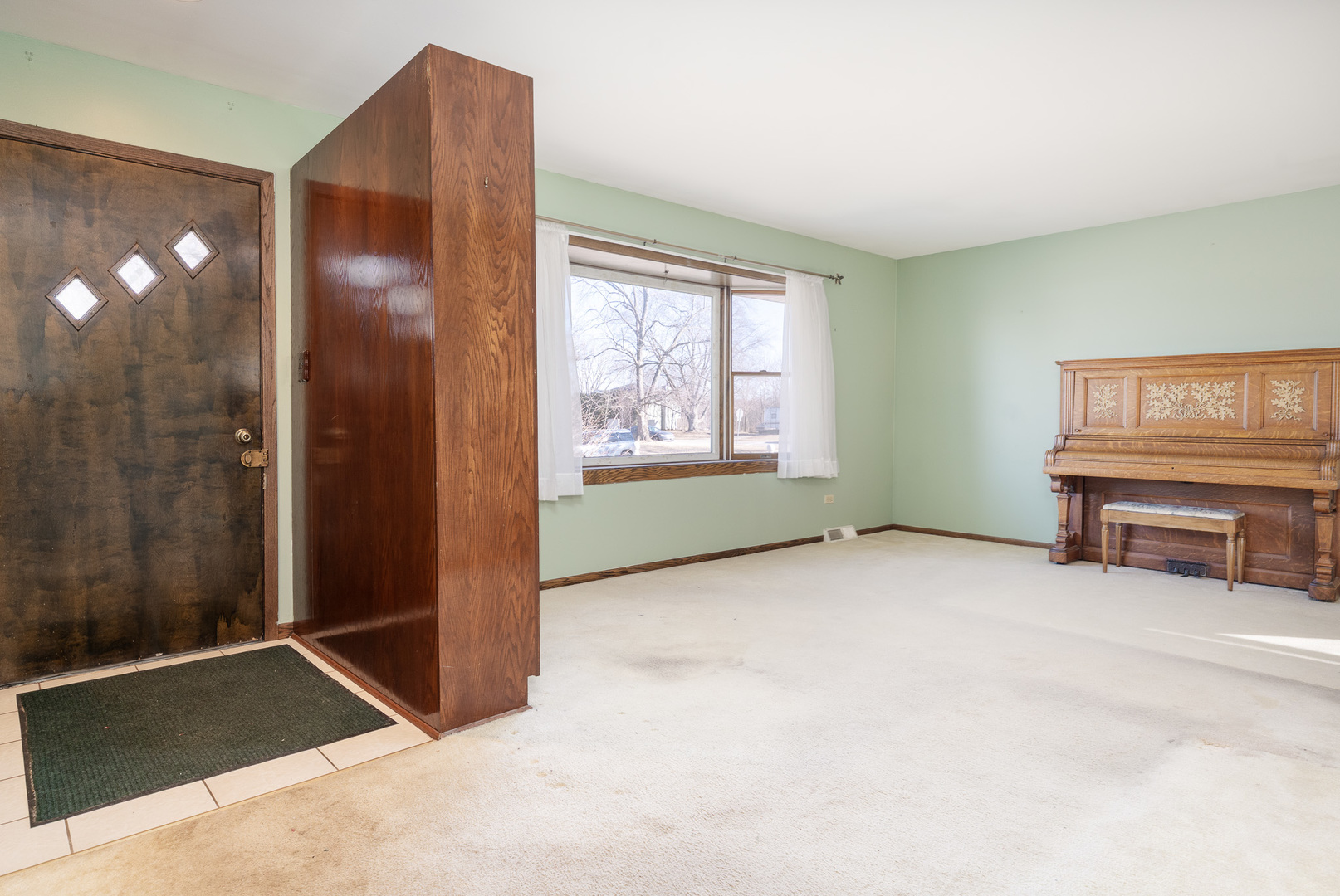 1327 Timberline Drive Joliet, IL 60431 - Photo 5 of 35 a view of an empty room with a window