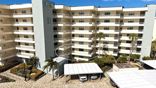 a picture of a brick building with many windows