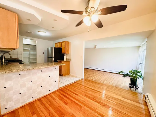 a spacious bathroom with a large mirror