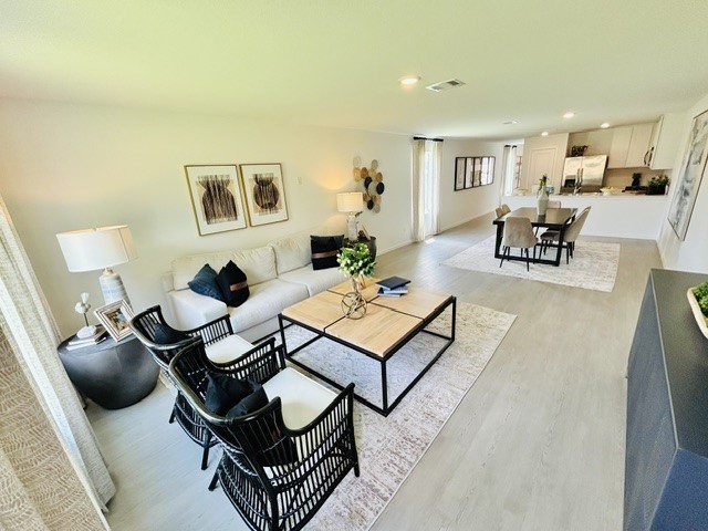 1747 West Stroker Road Crosby, TX 77532 - Photo 16 of 42 Representation of Model Home - Living/Dining area