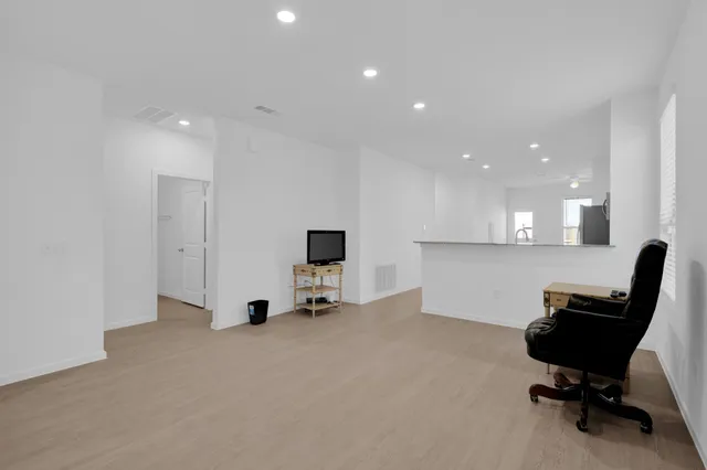 a view of workspace with livingroom