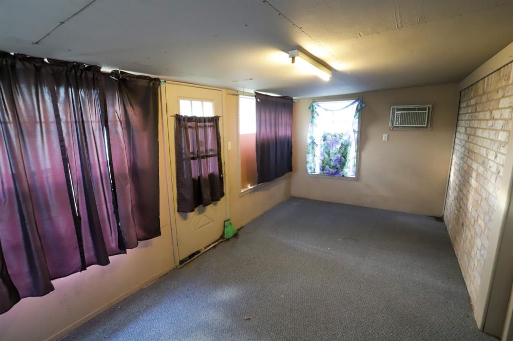 1009 Buchanan Street McGregor, TX 76657 - Photo 13 of 14 a view of an empty room and window