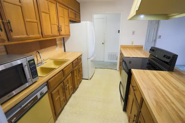 a bed room with a bed and furniture