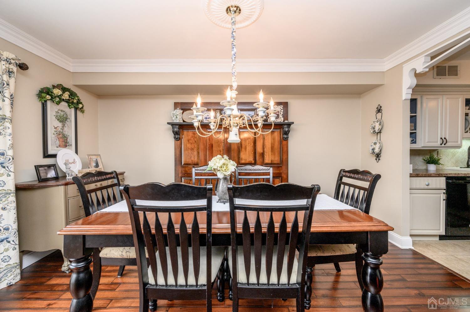 607 Randall Way Aberdeen, NJ 07747 - Photo 13 of 35 a view of a dining room with furniture and window