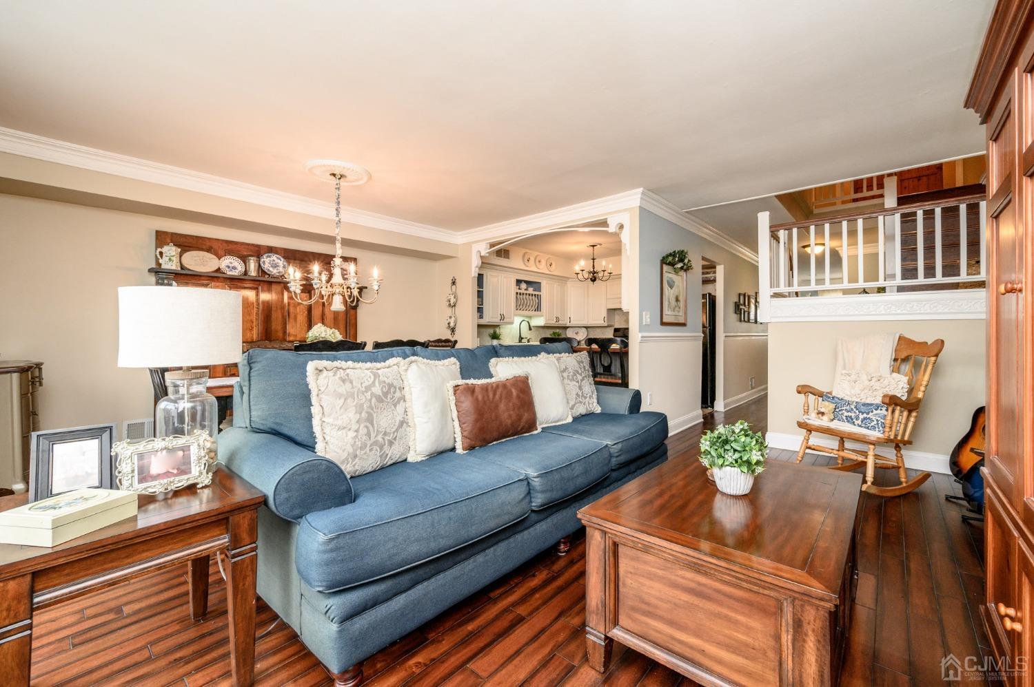 607 Randall Way Aberdeen, NJ 07747 - Photo 15 of 35 a living room with furniture and a table