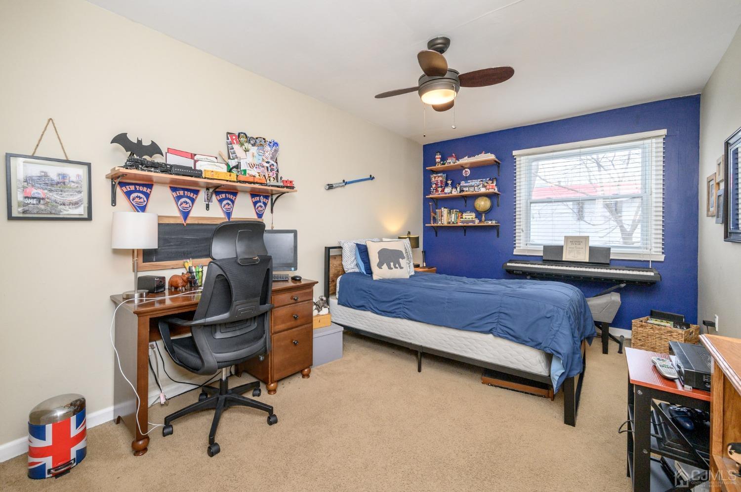 607 Randall Way Aberdeen, NJ 07747 - Photo 24 of 35 a bedroom with furniture and a window