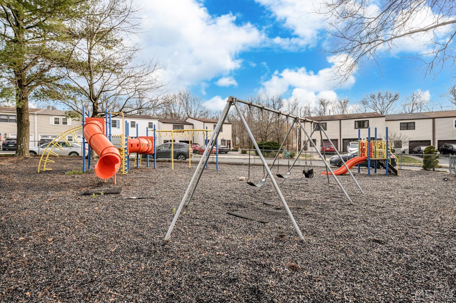 607 Randall Way Aberdeen, NJ 07747 - Photo 30 of 35 a view of outdoor space with playground and green space