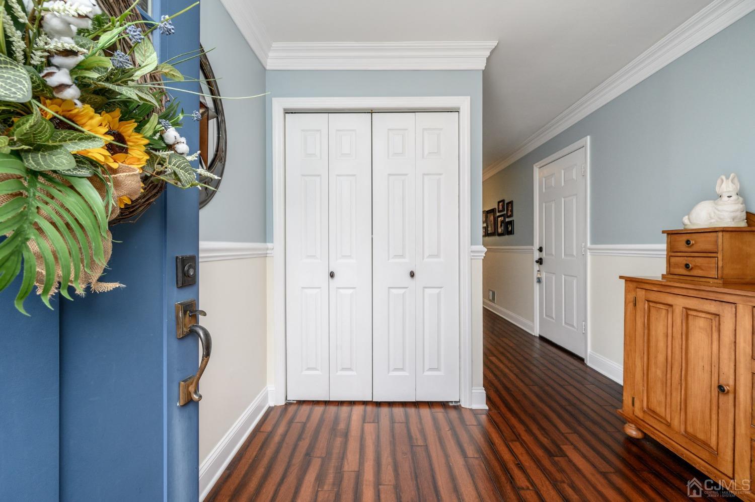 607 Randall Way Aberdeen, NJ 07747 - Photo 3 of 35 a view of hallway with wooden floor