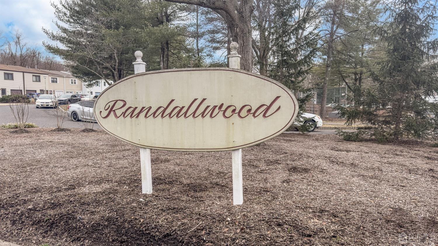 607 Randall Way Aberdeen, NJ 07747 - Photo 35 of 35 a table with a wooden fence