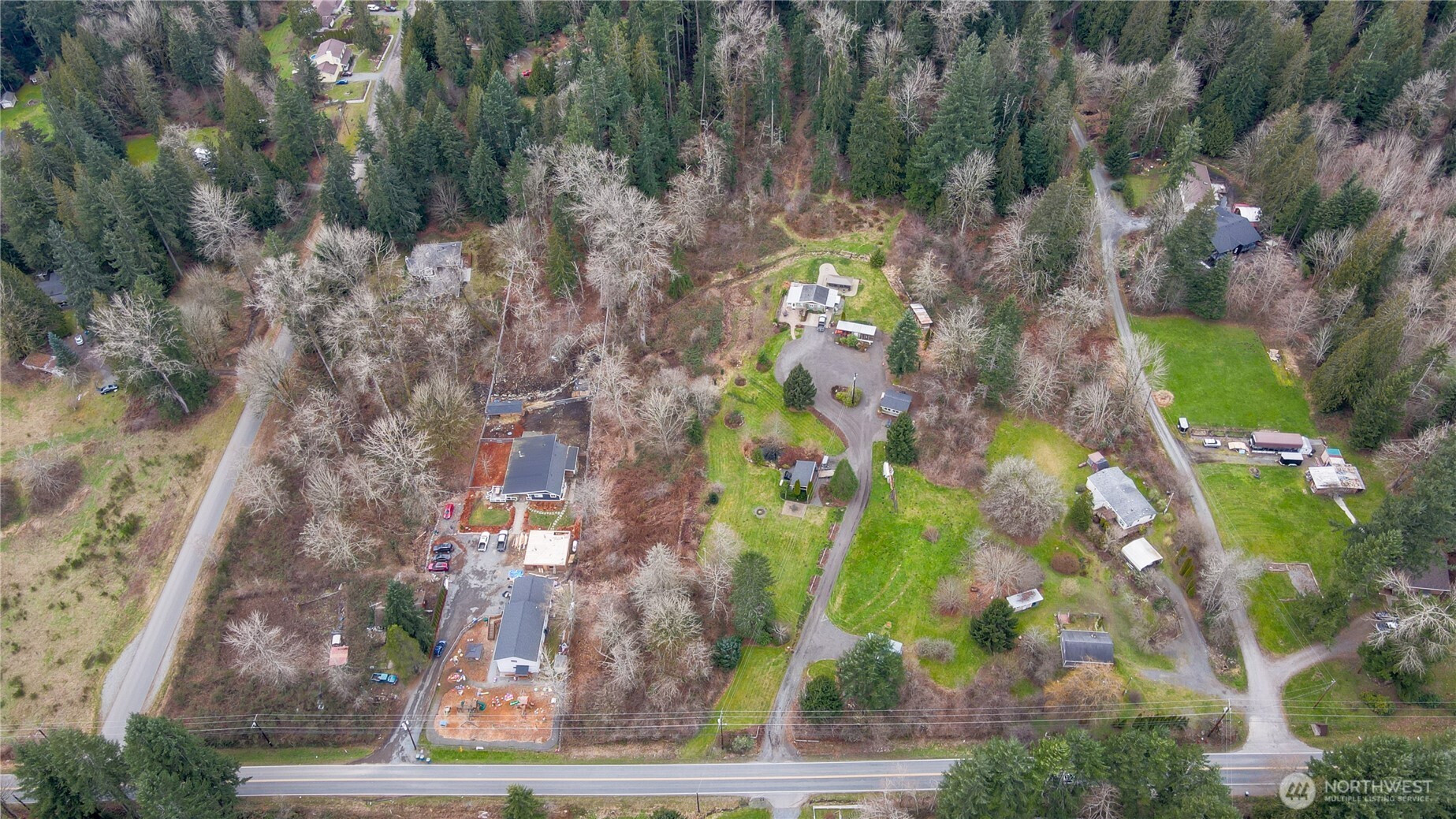12514 Chain Lake Road Snohomish, WA 98290 - Photo 2 of 25 an aerial view of a residential houses with outdoor space