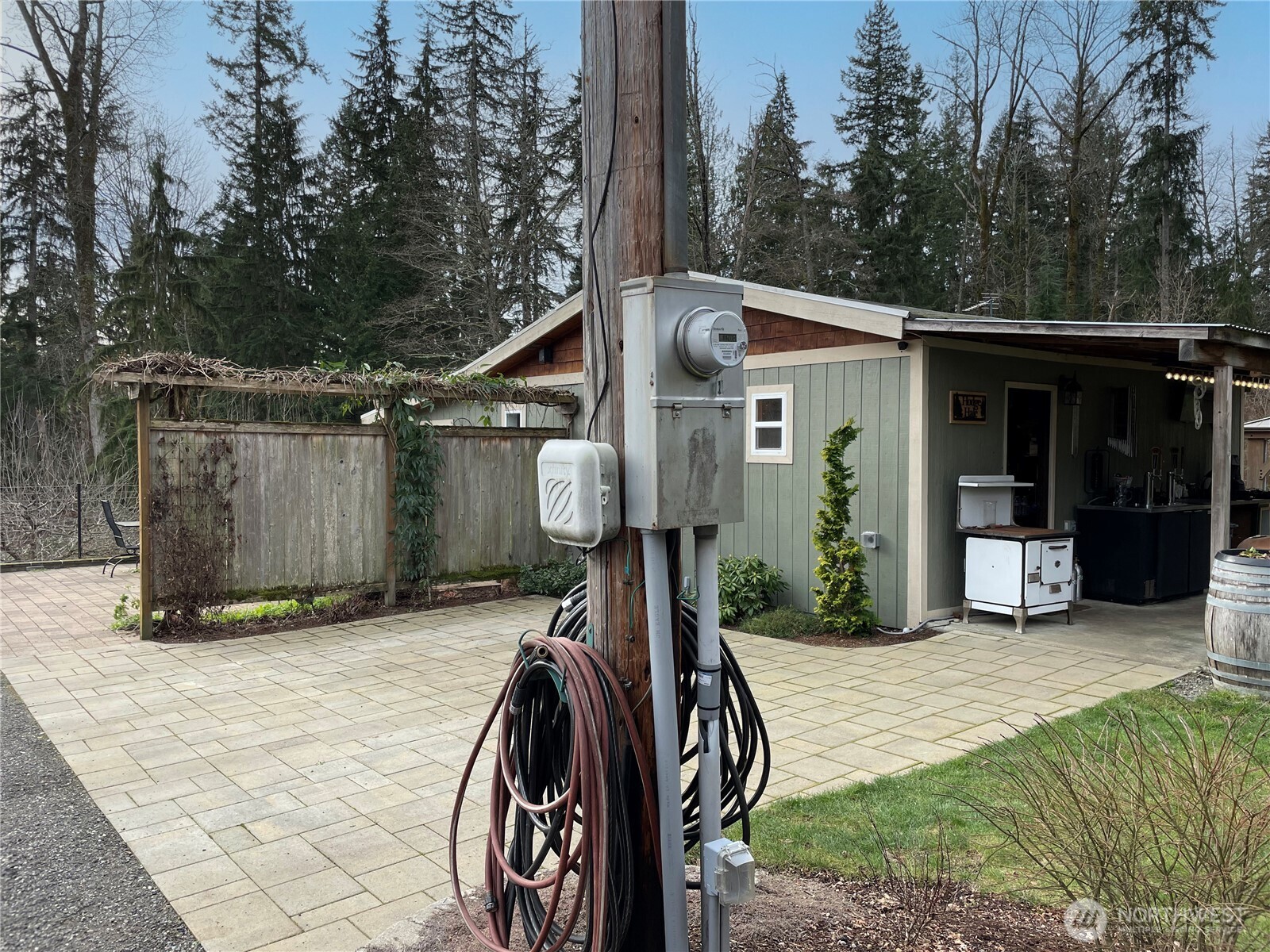 12514 Chain Lake Road Snohomish, WA 98290 - Photo 24 of 27 a view of a house with backyard and trees