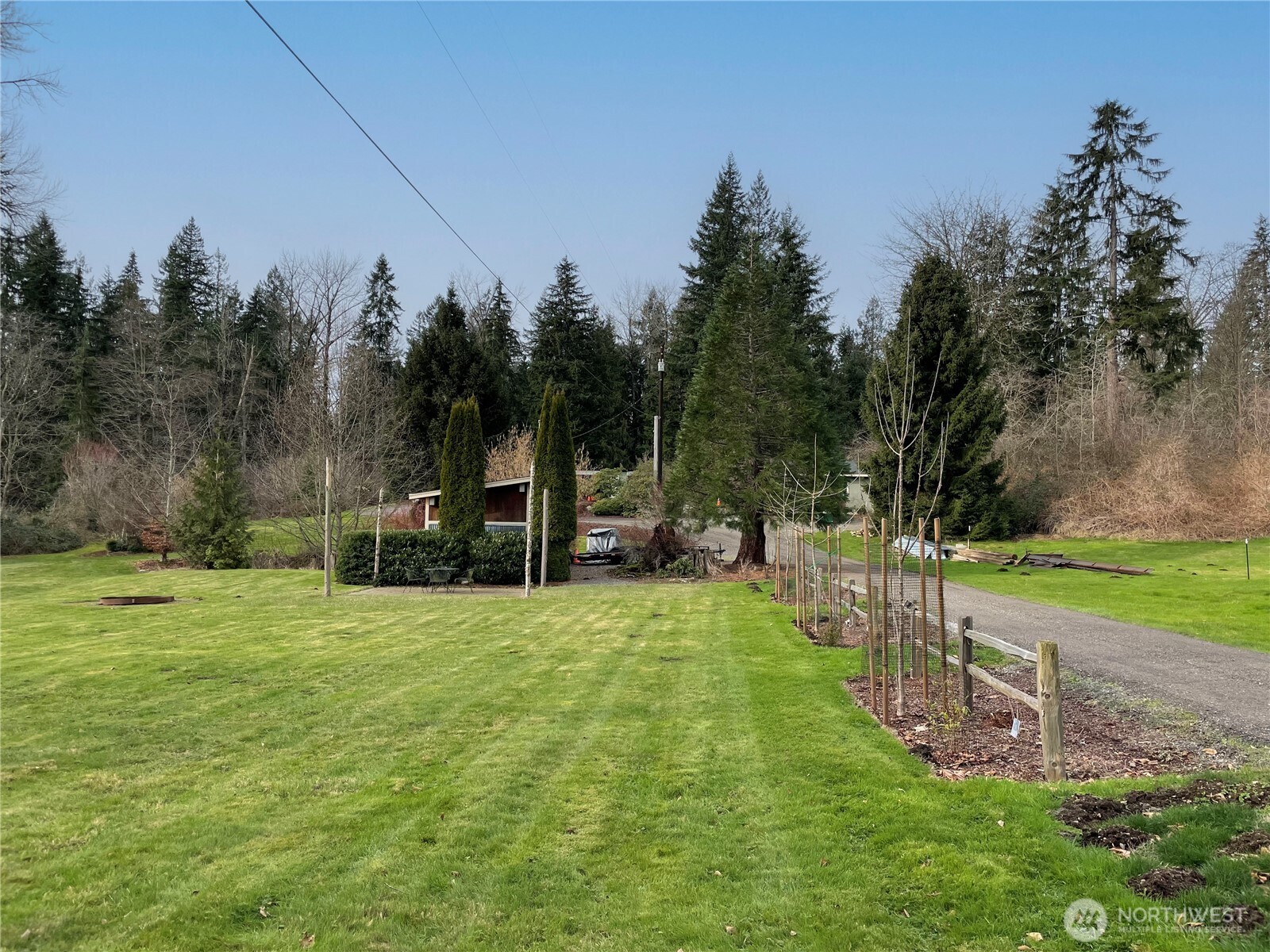 12514 Chain Lake Road Snohomish, WA 98290 - Photo 6 of 27 a view of a park with large trees