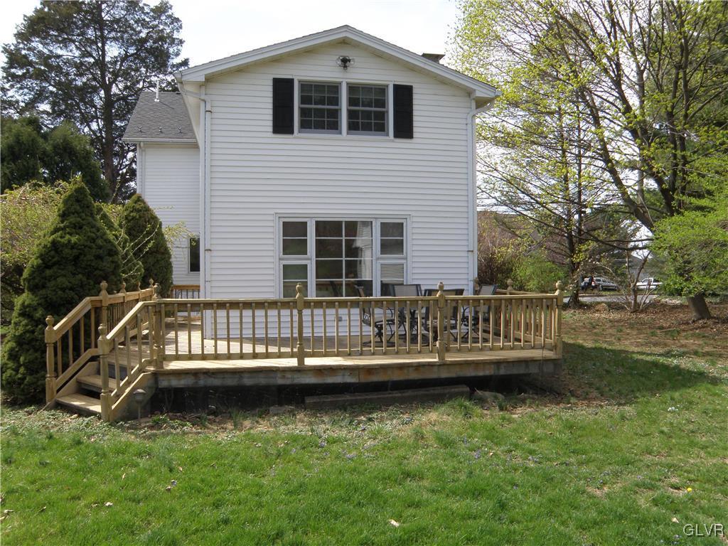 4202 Bethman Road Easton, PA 18045 - Photo 4 of 28 a view of a wooden deck with a yard
