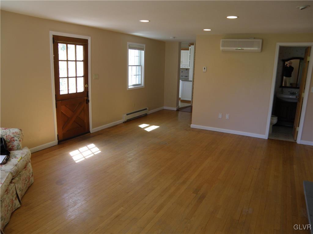 4202 Bethman Road Easton, PA 18045 - Photo 7 of 28 a view of an empty room with window and wooden floor