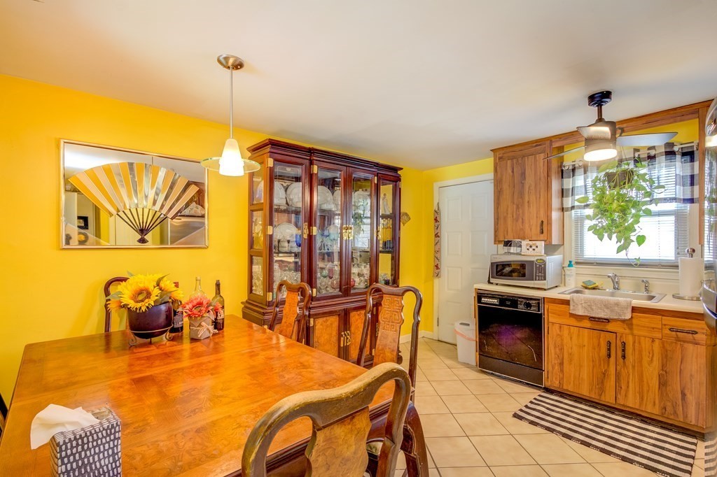 55 Jacob Street Boston, MA 02124 - Photo 9 of 22 a view of a dining room with furniture window and outside view