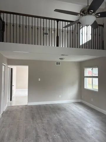 an empty room with windows