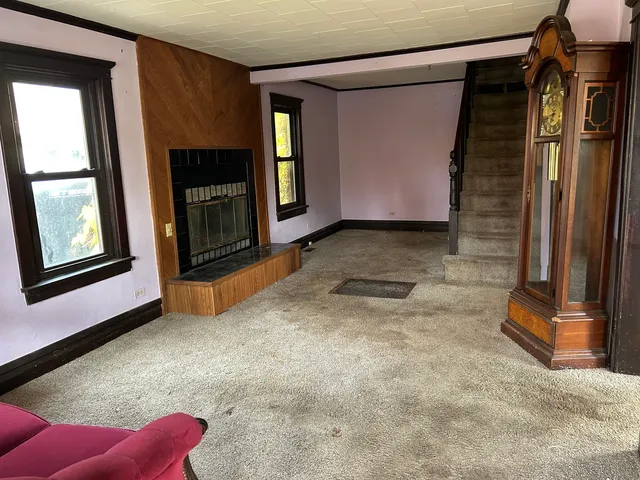 a view of front door with yard