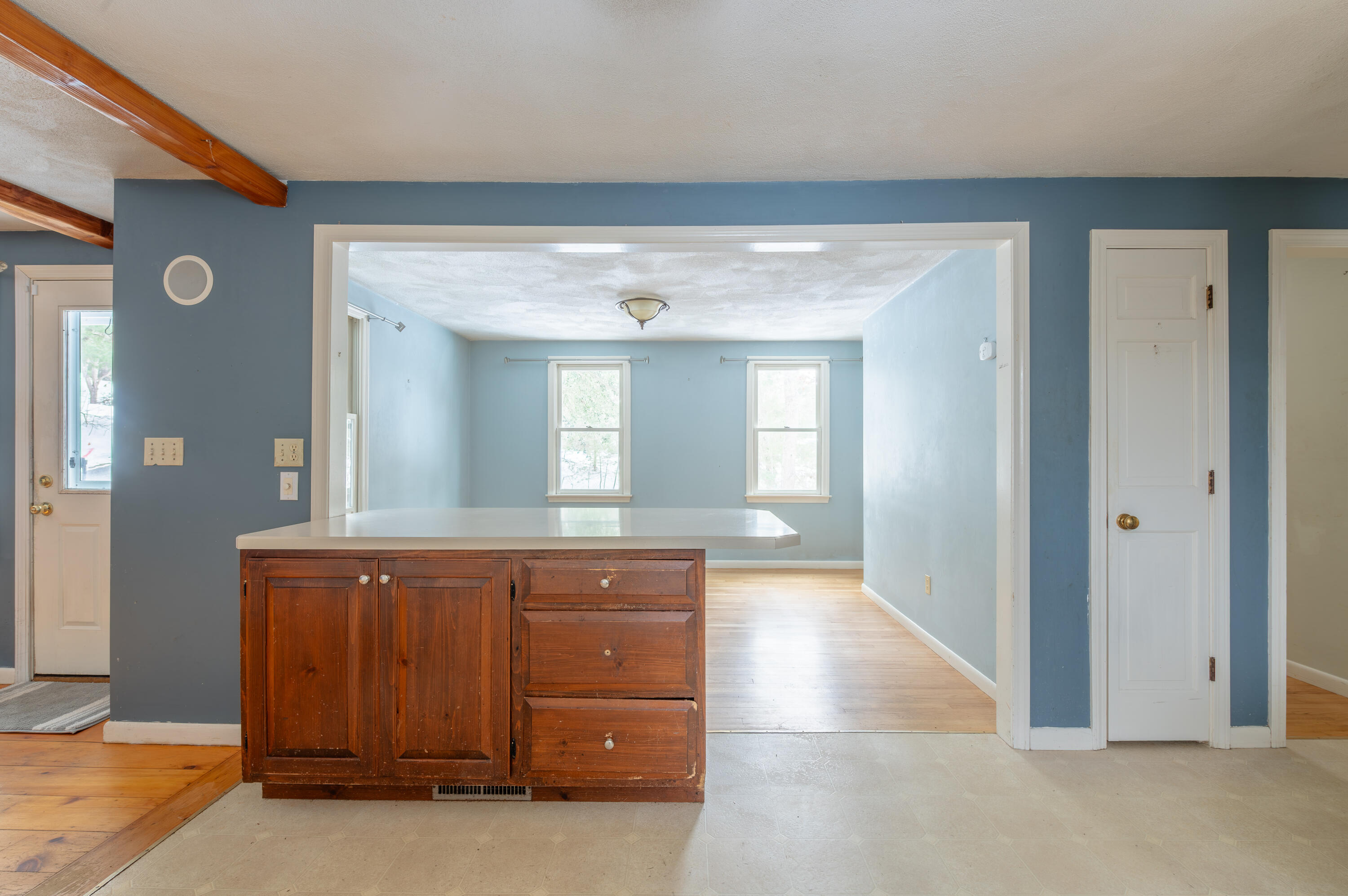 16 Michael Road Pocasset, MA 02559 - Photo 12 of 43 a view of a hallway with windows and chandelier
