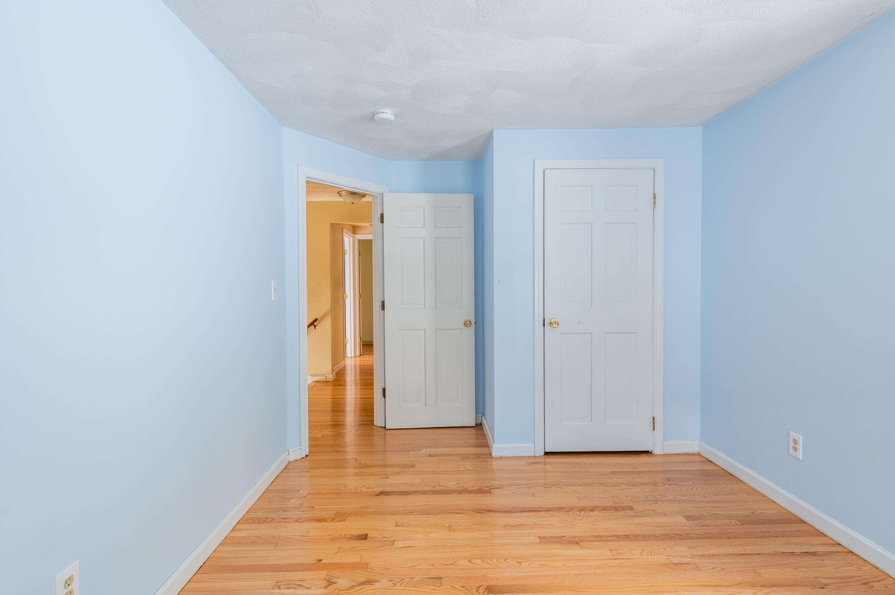 16 Michael Road Pocasset, MA 02559 - Photo 31 of 43 a view of an empty room with wooden floor