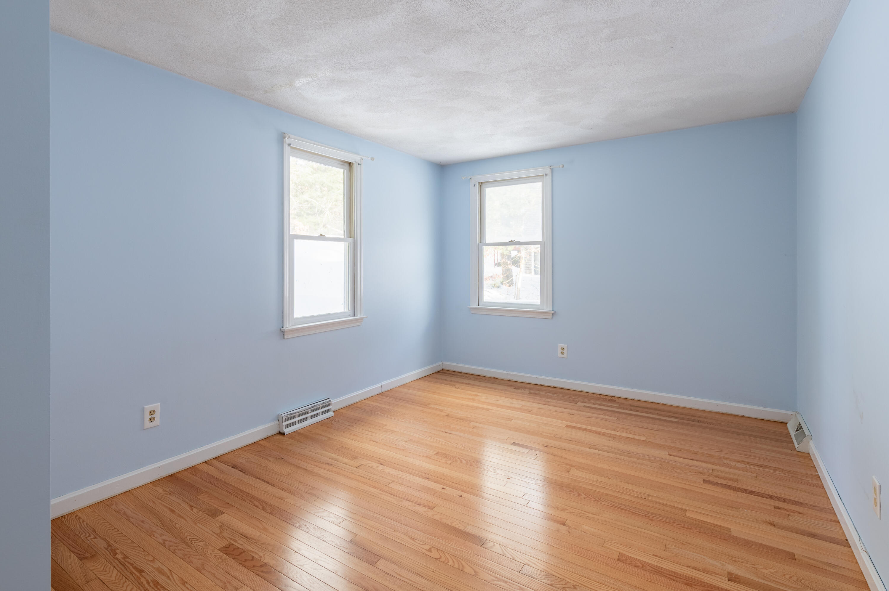 16 Michael Road Pocasset, MA 02559 - Photo 32 of 43 a view of an empty room with wooden floor and a window