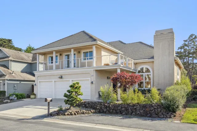 a front view of a house with yard