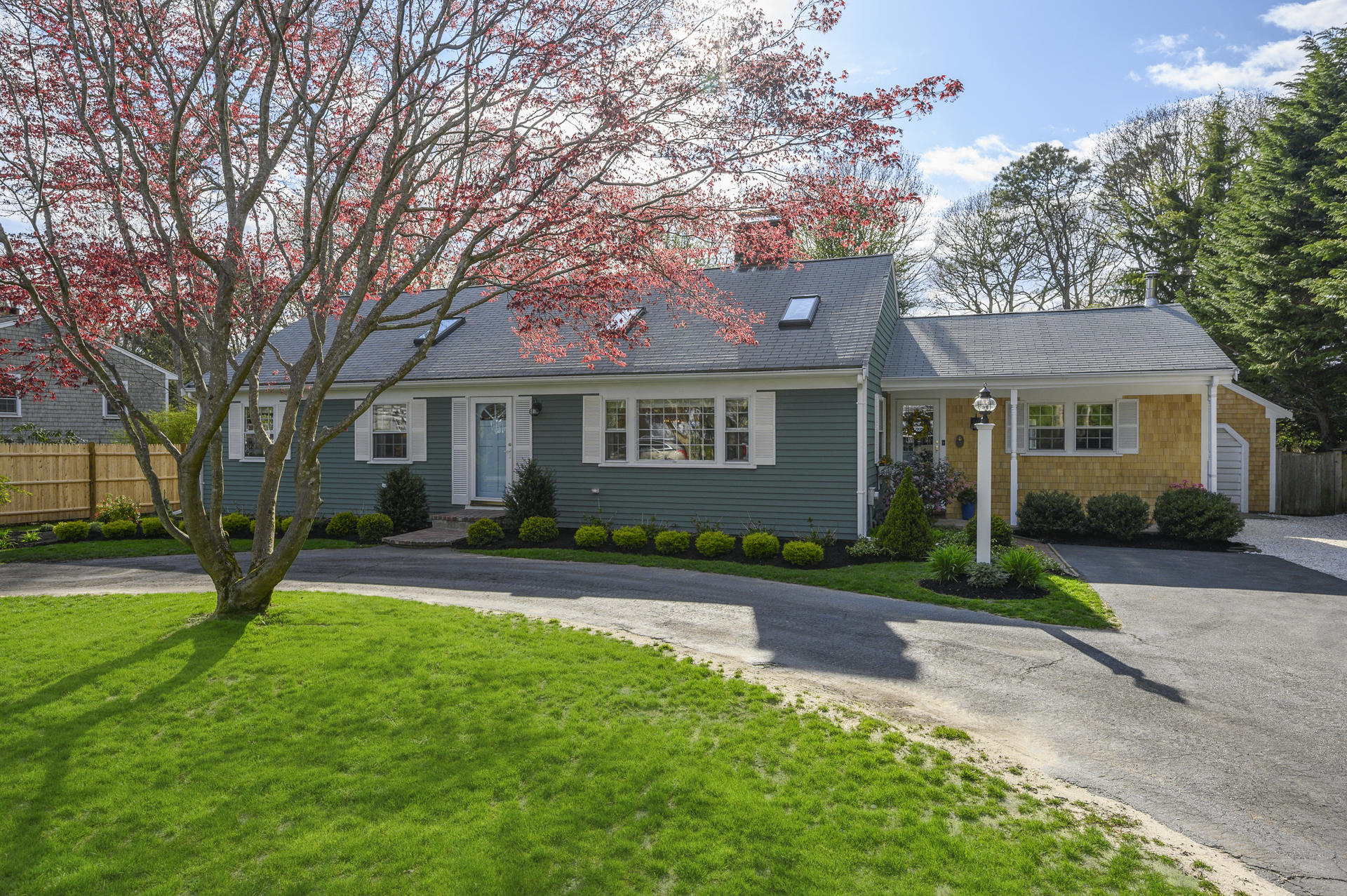 front view of a house with a yard