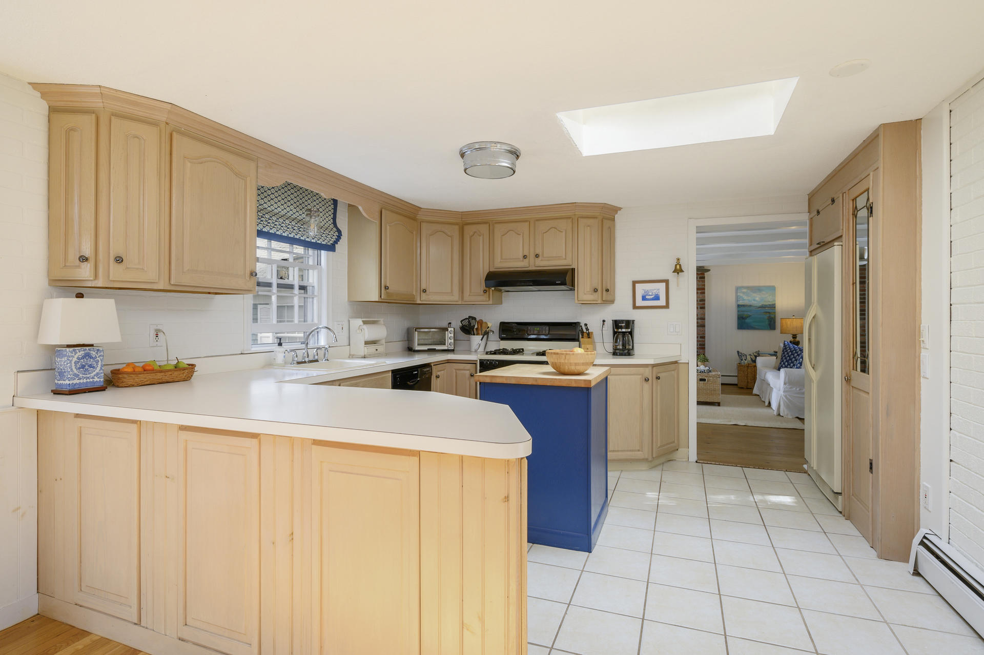 73 Knotty Pine Lane Centerville, MA 02632 - Photo 11 of 34 a kitchen with stainless steel appliances granite countertop a refrigerator sink and cabinets