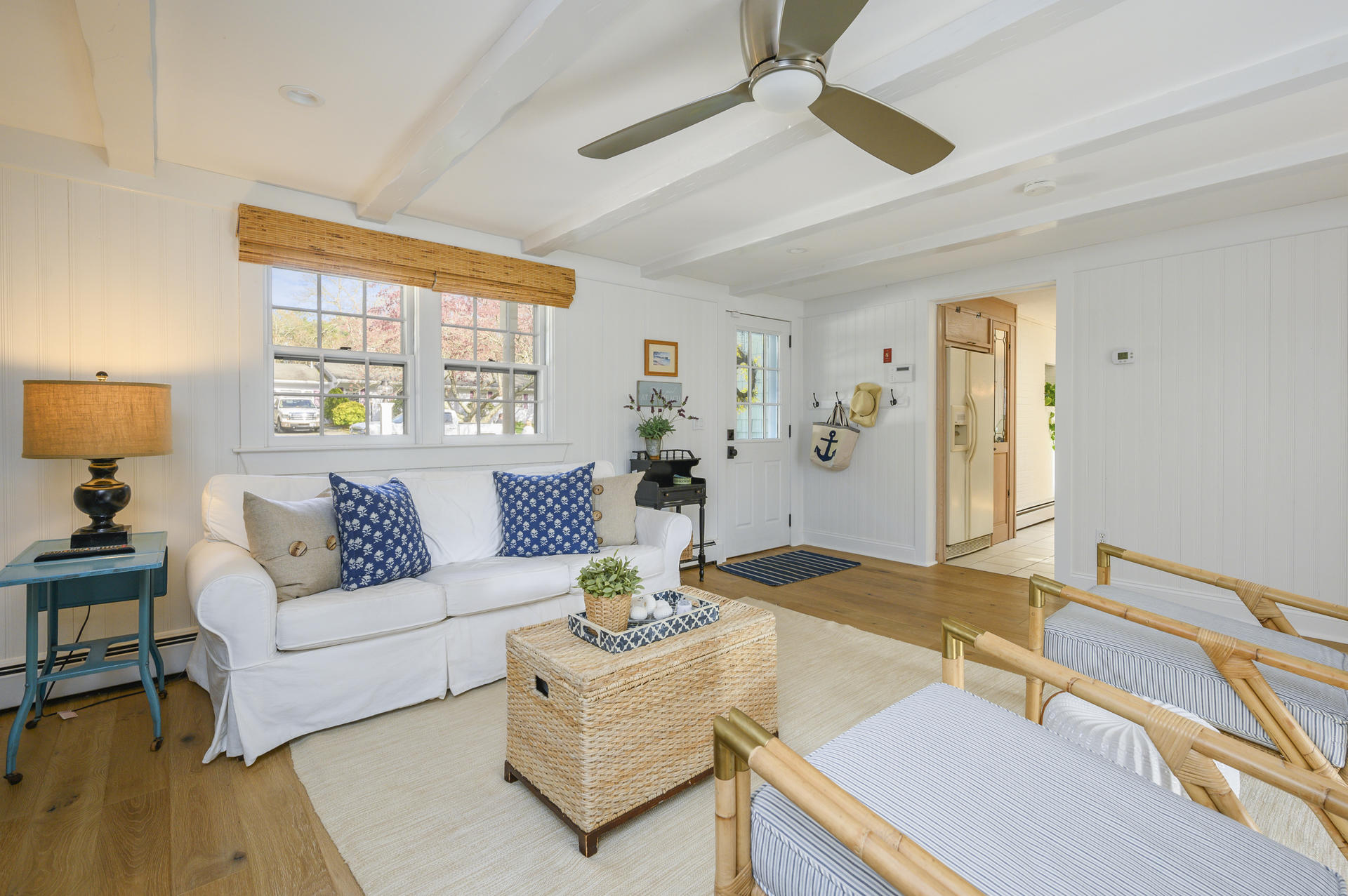 73 Knotty Pine Lane Centerville, MA 02632 - Photo 13 of 34 a living room with furniture a chandelier and a table
