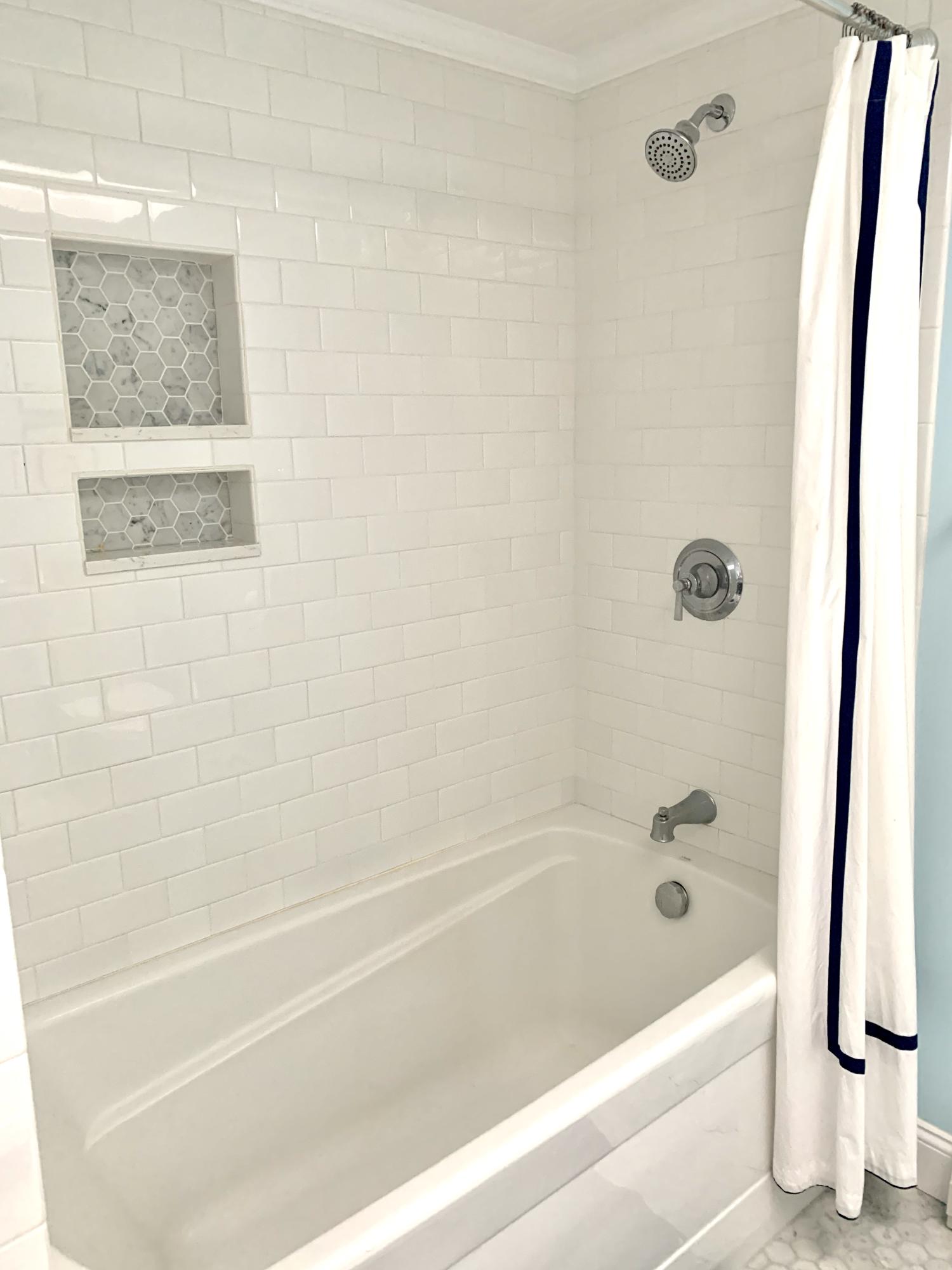 73 Knotty Pine Lane Centerville, MA 02632 - Photo 16 of 34 a bathroom with a bathtub