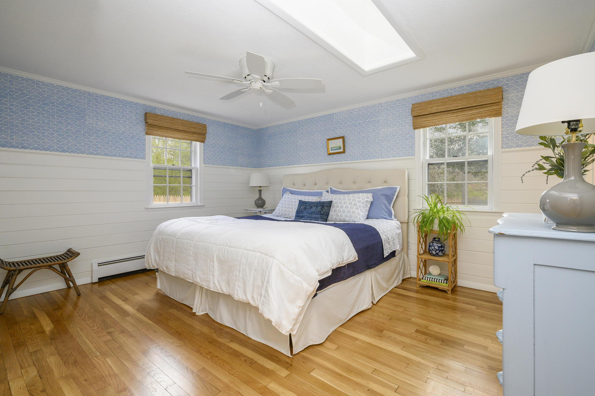 73 Knotty Pine Lane Centerville, MA 02632 - Photo 17 of 34 a bedroom with a bed and wooden floor