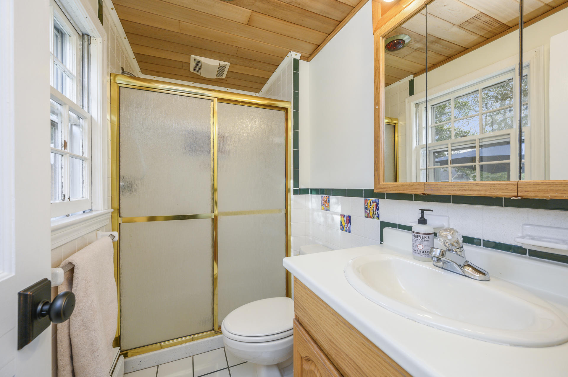 73 Knotty Pine Lane Centerville, MA 02632 - Photo 19 of 34 a bathroom with a sink toilet and shower