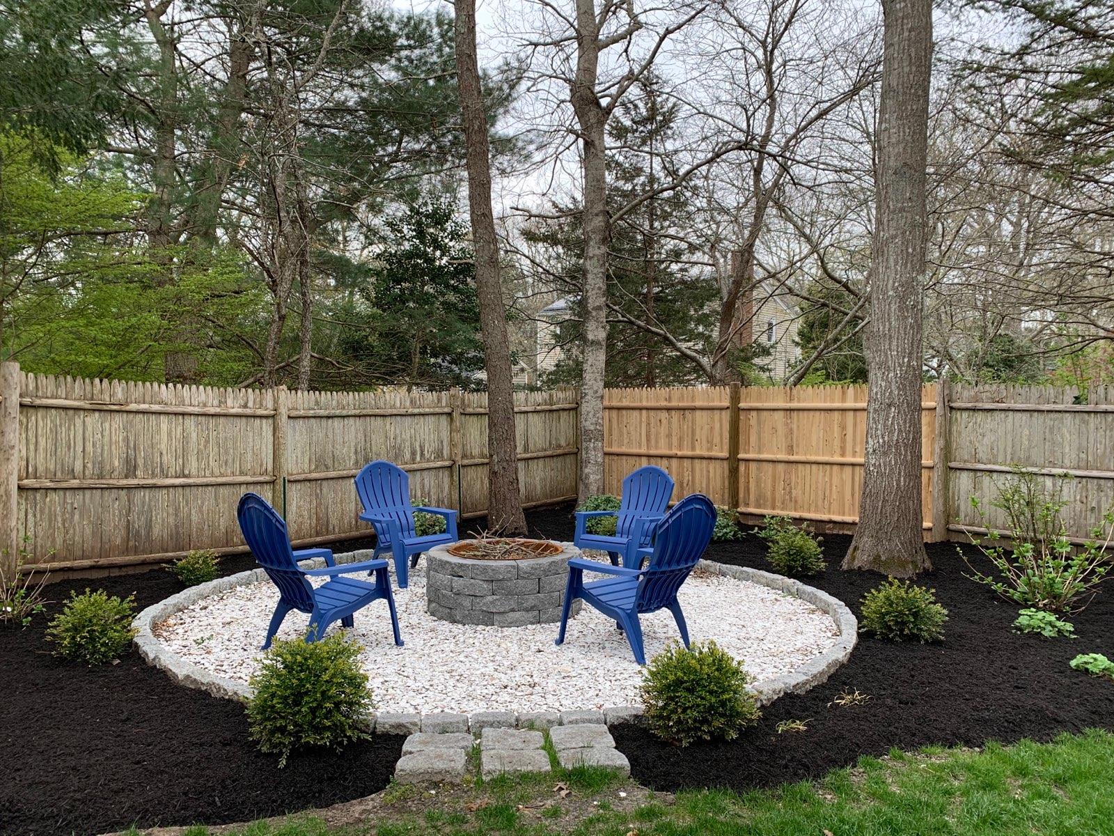 73 Knotty Pine Lane Centerville, MA 02632 - Photo 27 of 34 a view of a backyard with sitting area and furniture