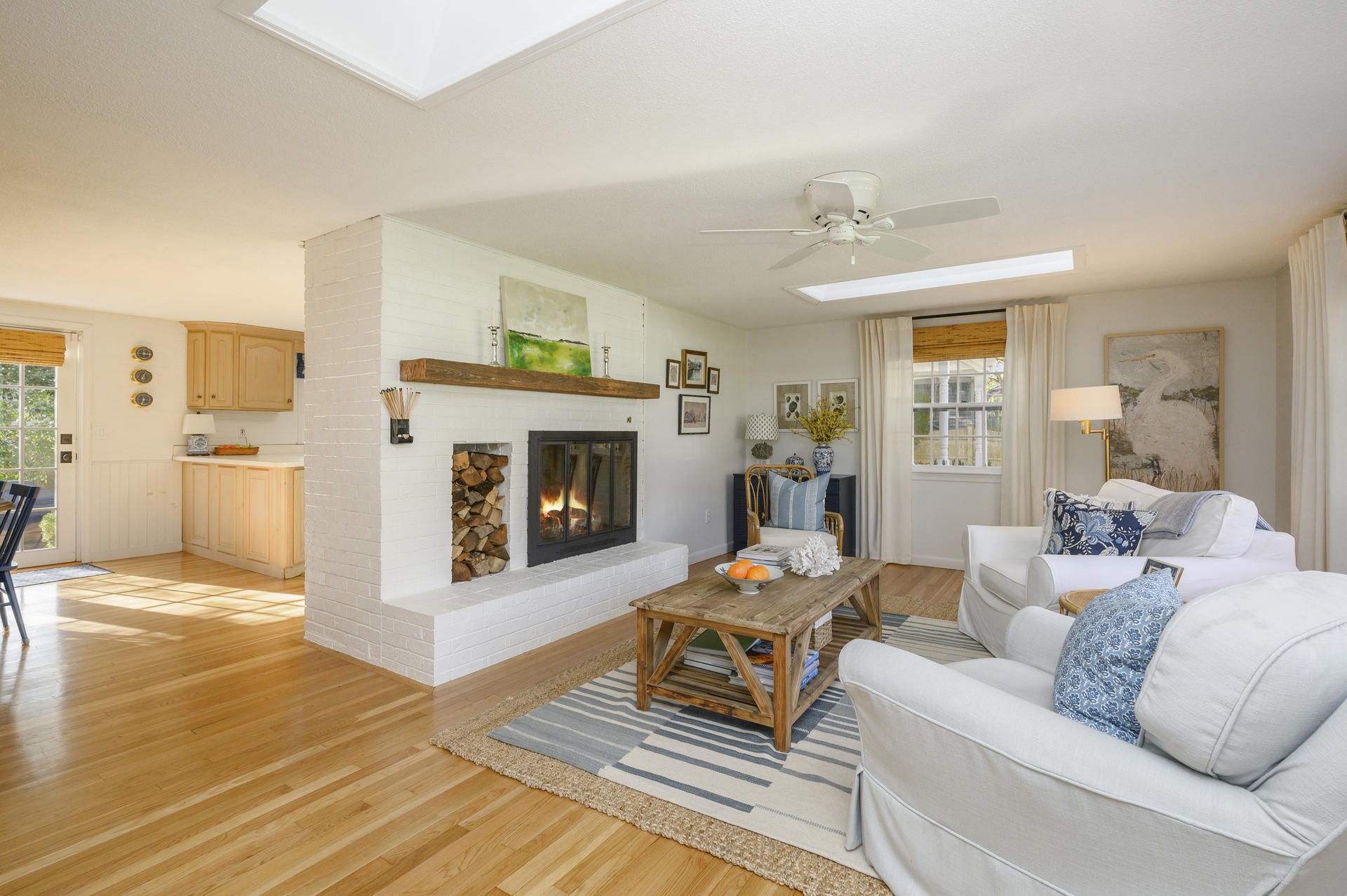 73 Knotty Pine Lane Centerville, MA 02632 - Photo 5 of 34 a living room with furniture and a fireplace