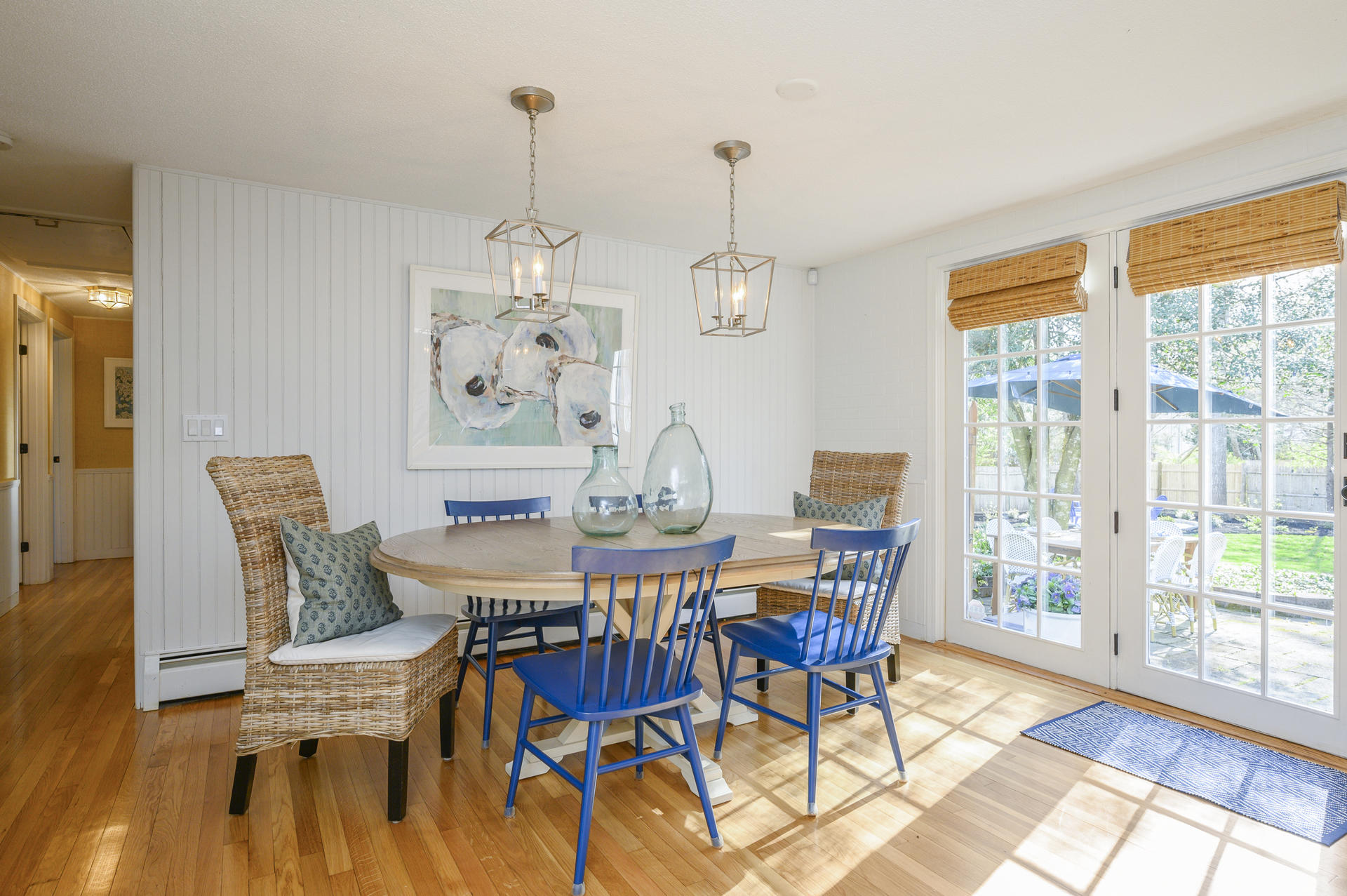 73 Knotty Pine Lane Centerville, MA 02632 - Photo 7 of 34 a view of a dining room with furniture wooden floor and a chandelier