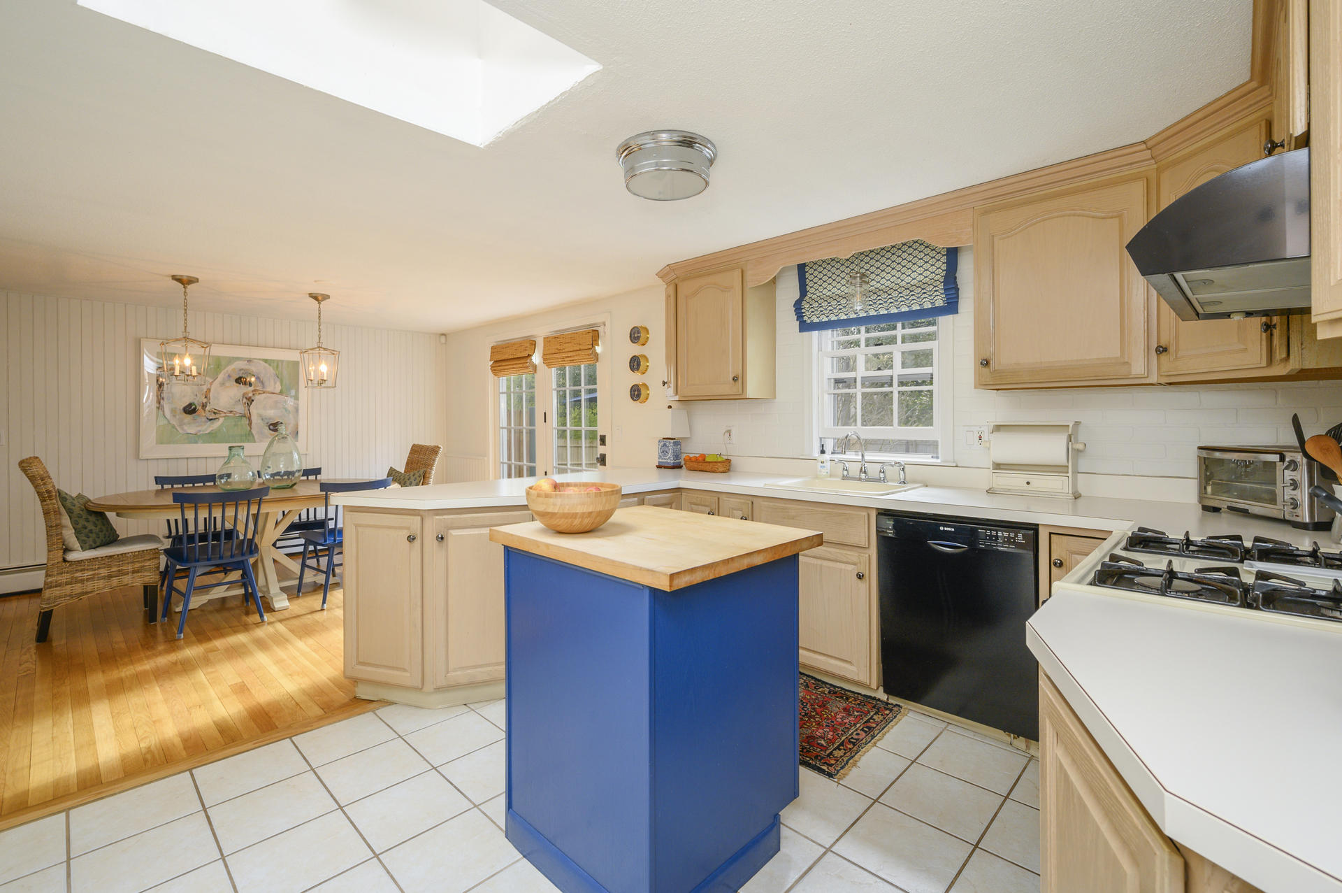 73 Knotty Pine Lane Centerville, MA 02632 - Photo 10 of 34 a kitchen with a sink stove and cabinets